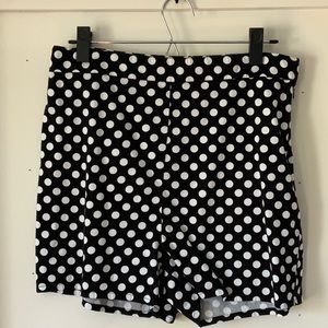 Black and white polka dot shorts.